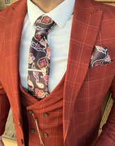 Elegante herenpak in terracotta